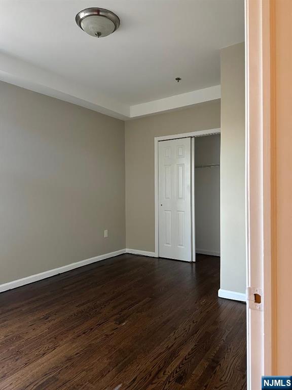 500 Fulton Street, Unit 1 Elizabeth, NJ 07206 - Photo 3 of 4 a view of an empty room with wooden floor