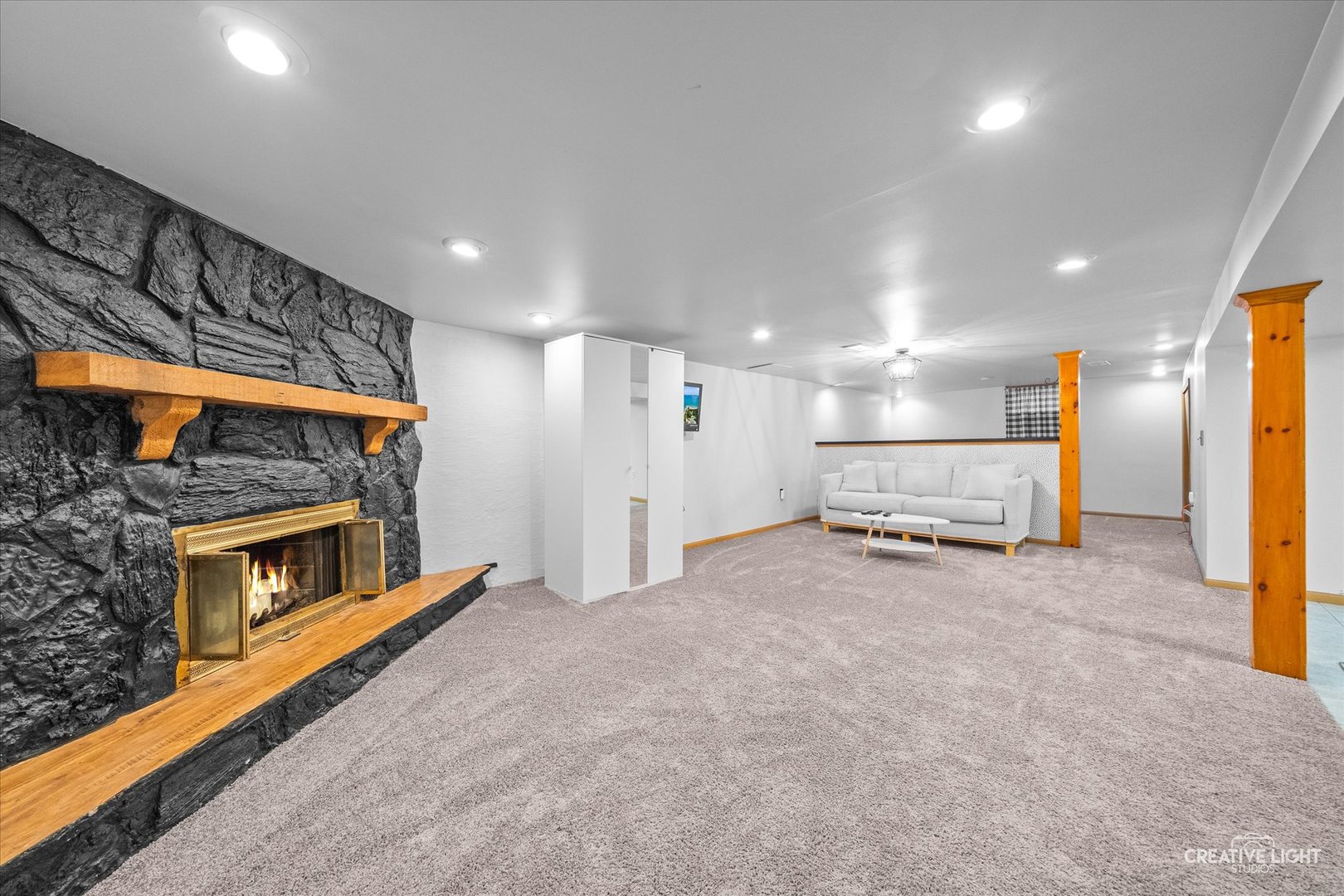 92 Neil Road Sugar Grove, IL 60554 - Photo 18 of 34 a living room with furniture and a fireplace