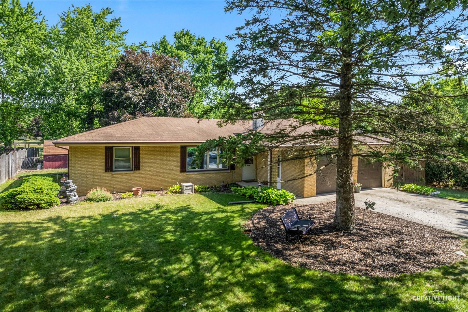 92 Neil Road Sugar Grove, IL 60554 - Photo 2 of 34 a front view of a house with garden
