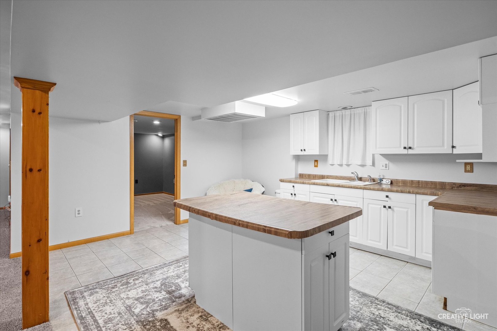 92 Neil Road Sugar Grove, IL 60554 - Photo 21 of 34 a kitchen with a sink and cabinets