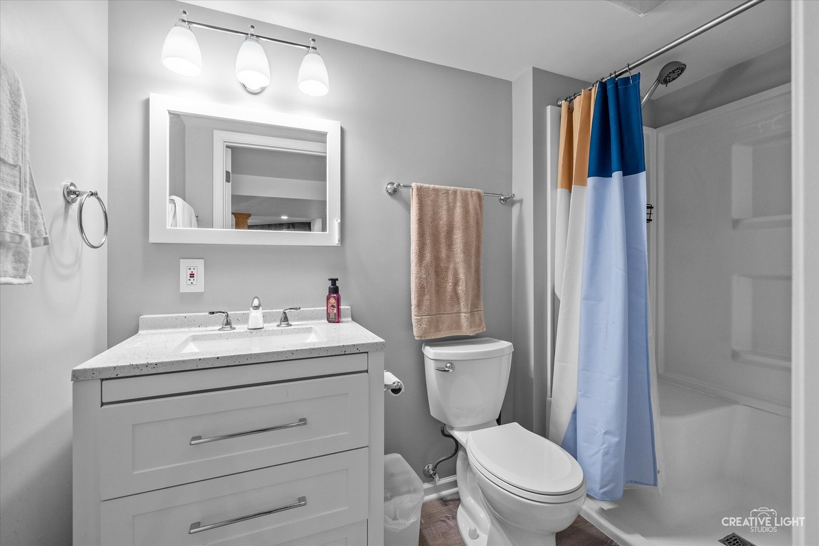 92 Neil Road Sugar Grove, IL 60554 - Photo 24 of 34 a bathroom with a toilet sink vanity and mirror