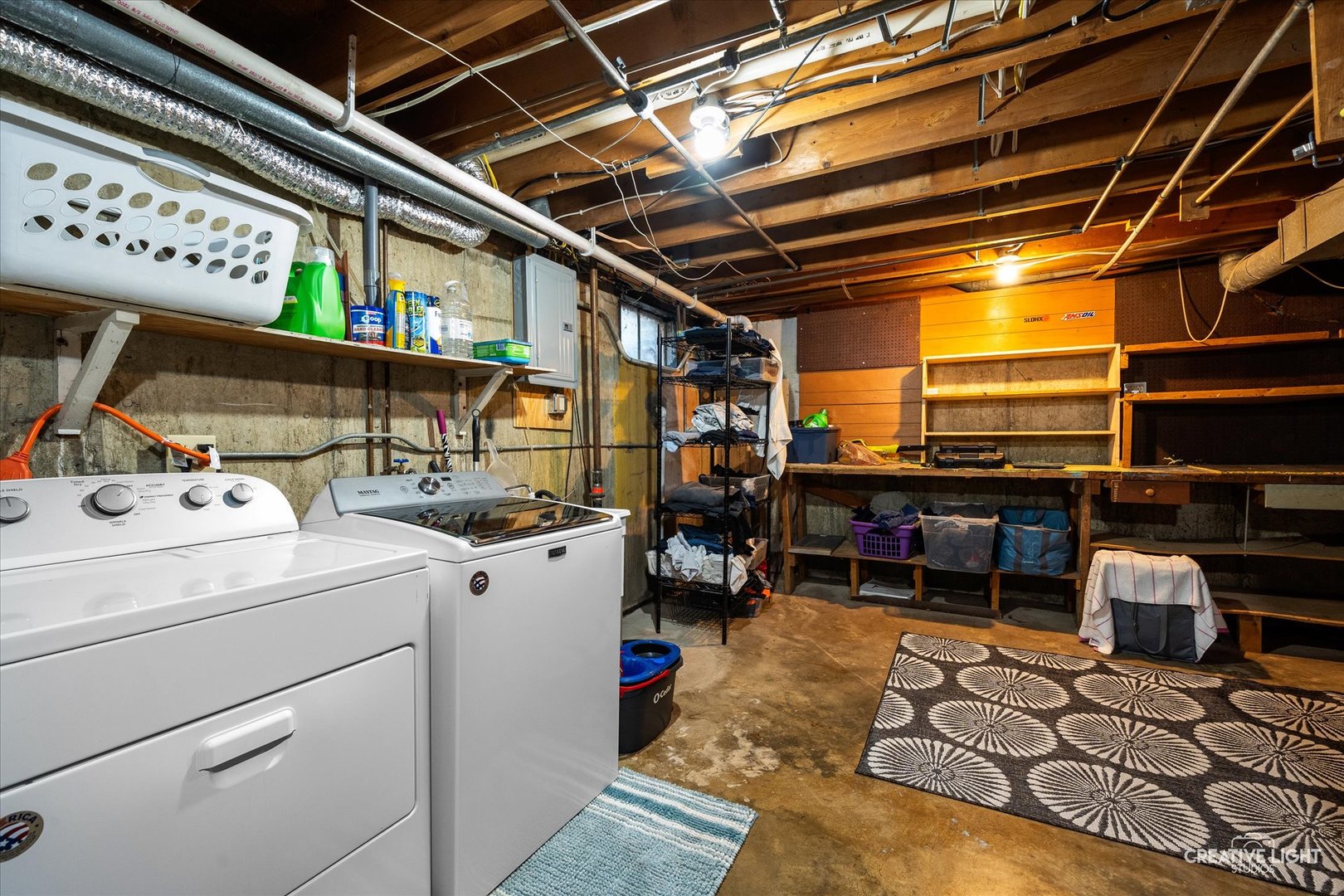 92 Neil Road Sugar Grove, IL 60554 - Photo 25 of 34 a storage room with washer and dryer