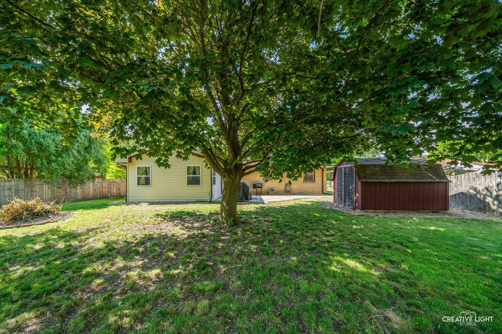 92 Neil Road Sugar Grove, IL 60554 - Photo 27 of 34 a tree in the garden of the house