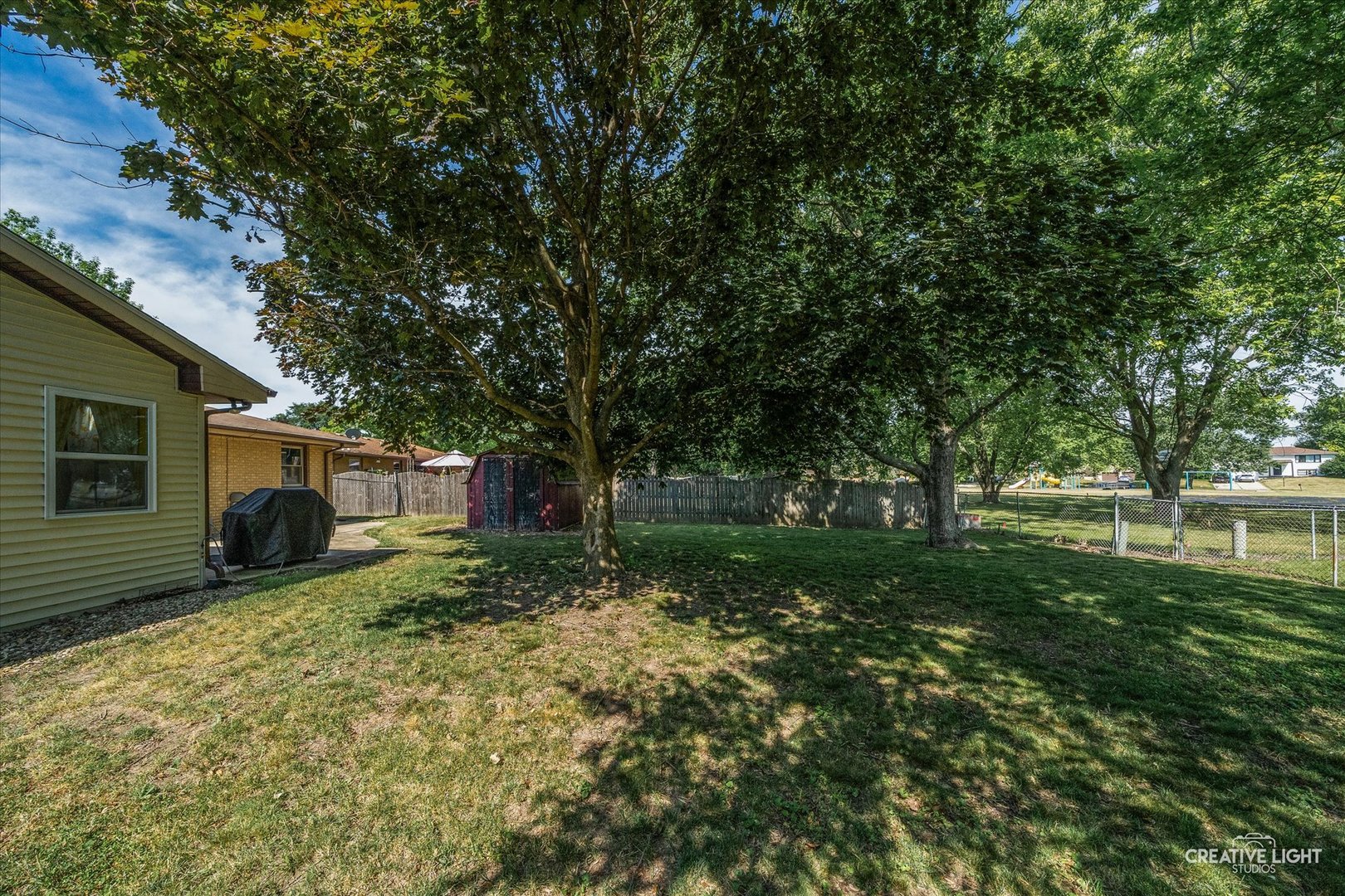 92 Neil Road Sugar Grove, IL 60554 - Photo 28 of 34 a view of backyard with trees
