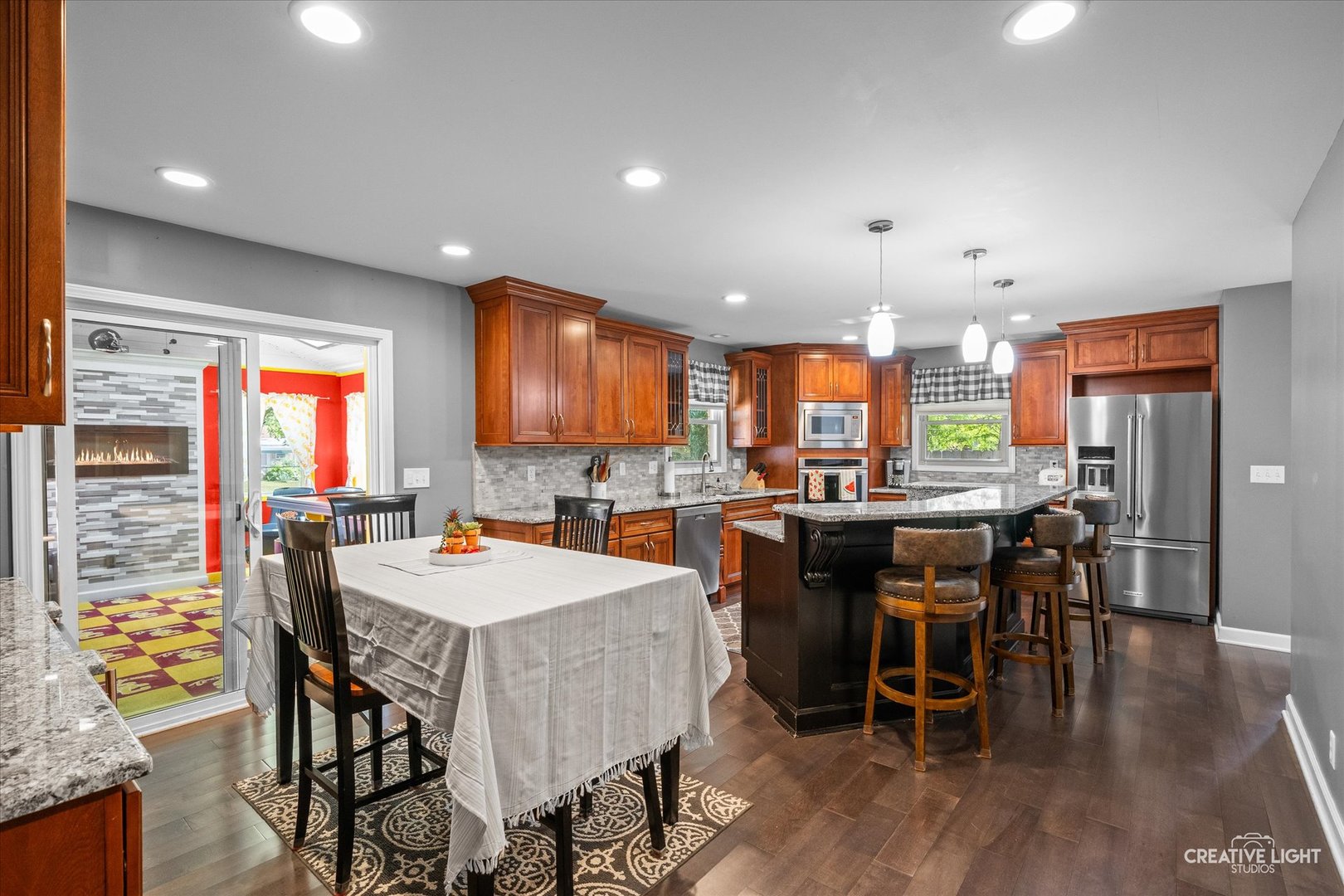 92 Neil Road Sugar Grove, IL 60554 - Photo 7 of 34 a large kitchen with a table and chairs
