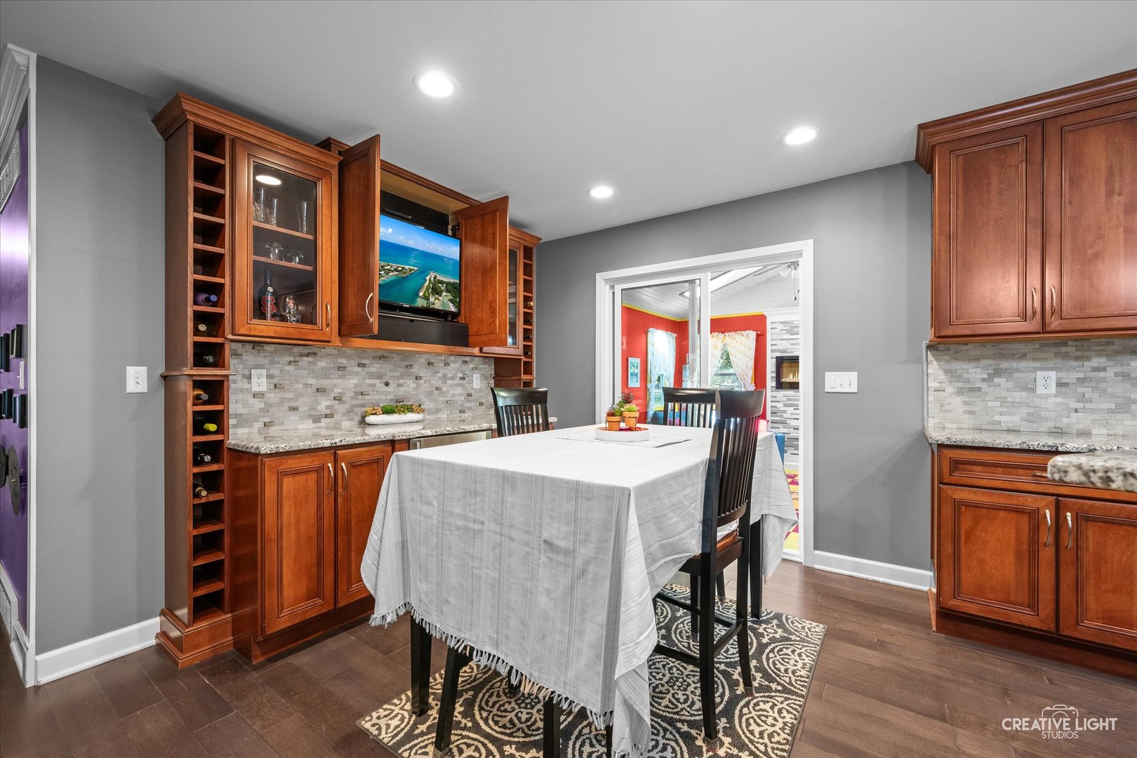 92 Neil Road Sugar Grove, IL 60554 - Photo 10 of 34 a kitchen with a table chairs sink and wooden floor