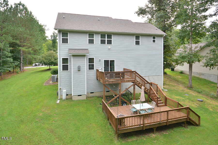 195 Timberwind Road Franklinton, NC 27525 - Photo 2 of 28 a view of a house with backyard