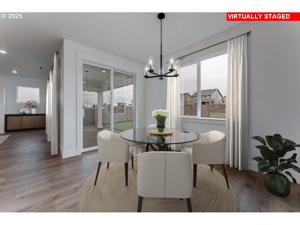 1324 East Canto Newberg, OR 97132 - Photo 4 of 10 a living room with furniture and a chandelier