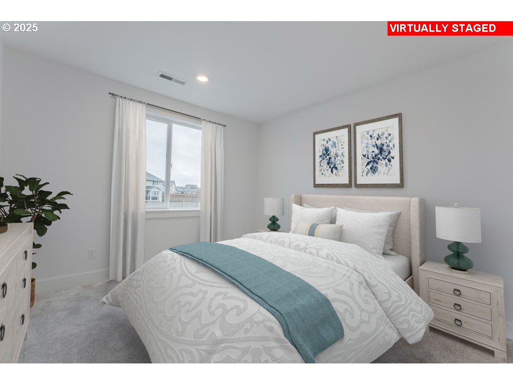 1324 East Canto Newberg, OR 97132 - Photo 8 of 10 a bedroom with a large bed and a potted plant