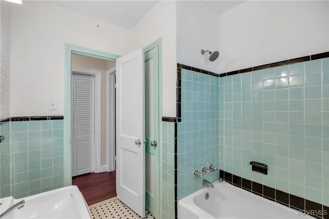 a bathroom with a shower and a toilet