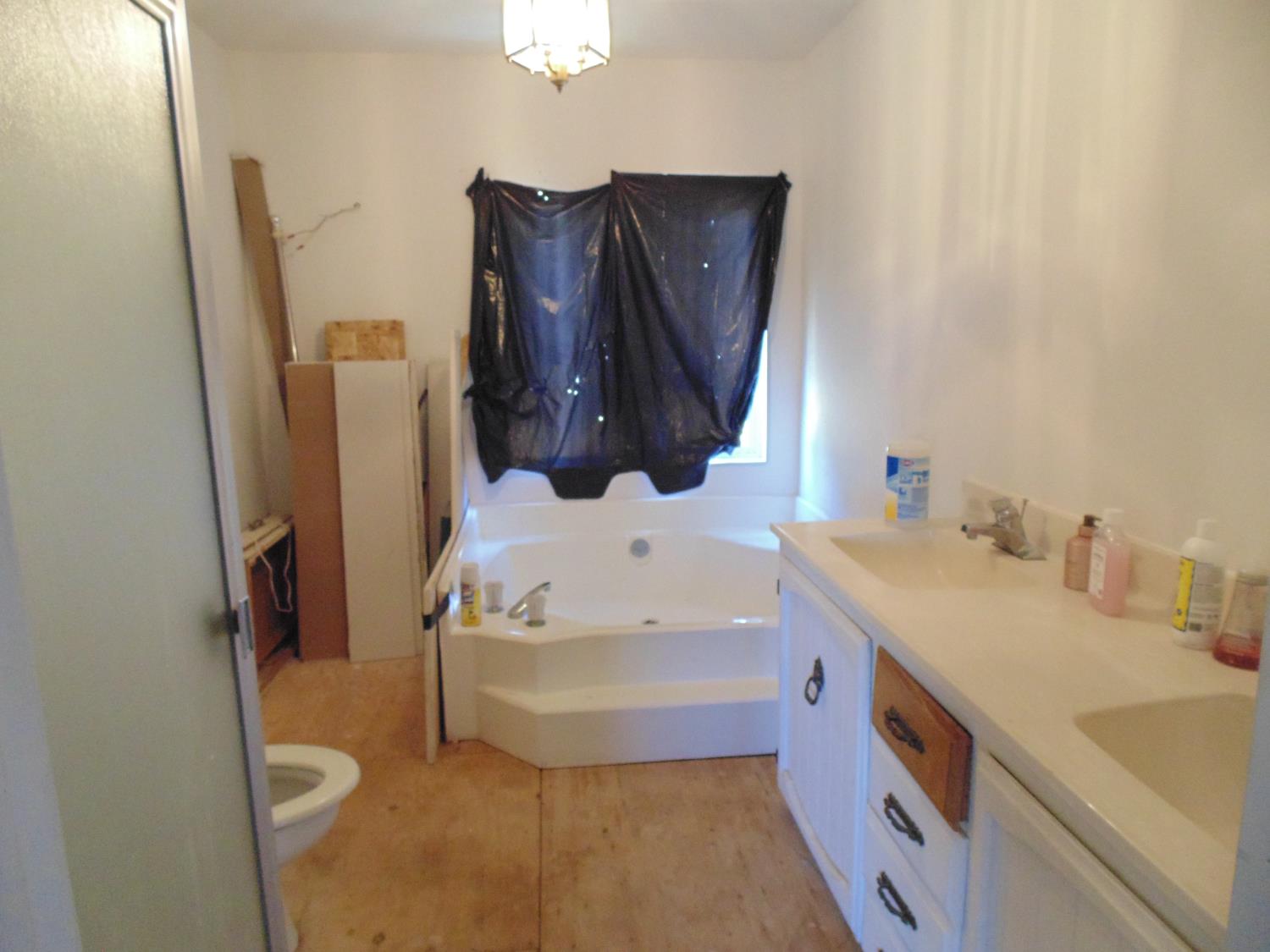 4161 Ginger Road Garden Valley, CA 95633 - Photo 19 of 32 a bathroom with a sink and a mirror