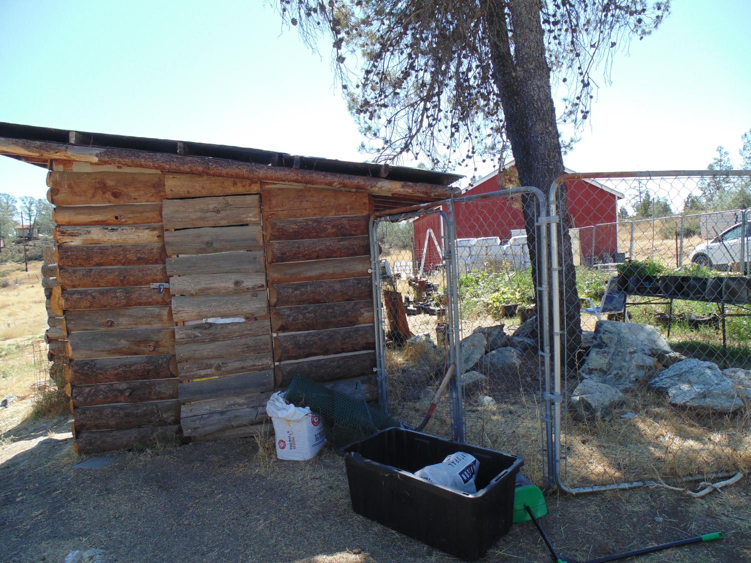 4161 Ginger Road Garden Valley, CA 95633 - Photo 30 of 32 a backyard of a house with outdoor seating