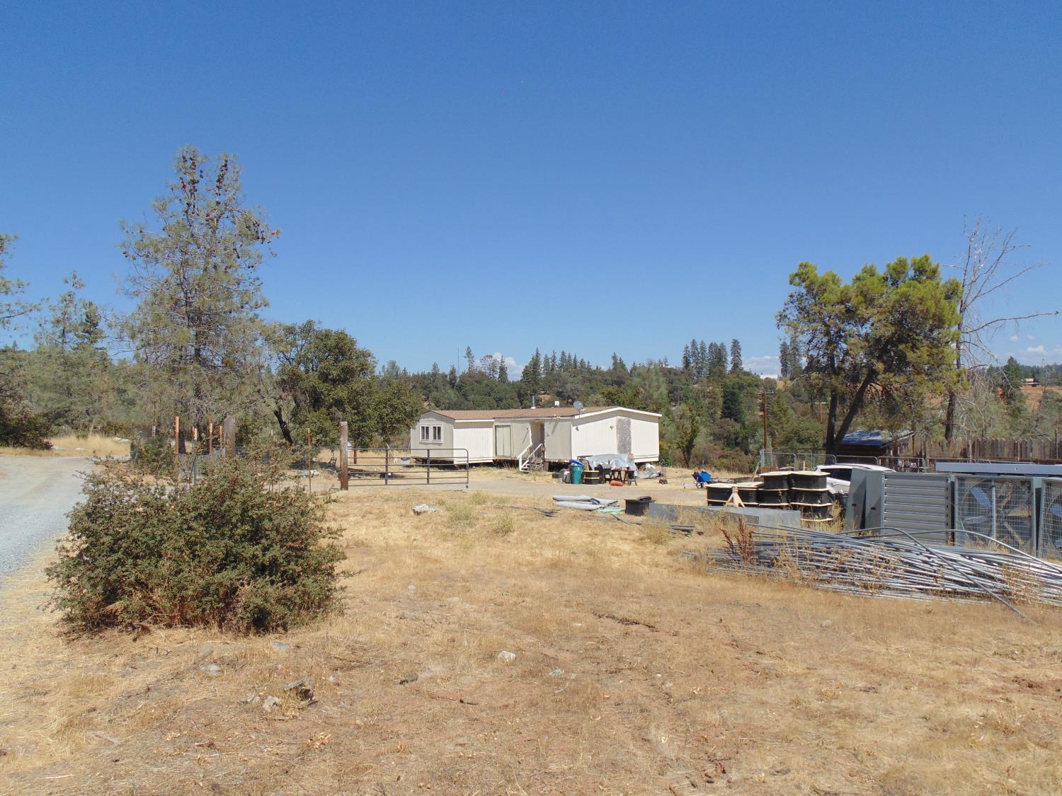 4161 Ginger Road Garden Valley, CA 95633 - Photo 6 of 32 a view of a yard with a slide