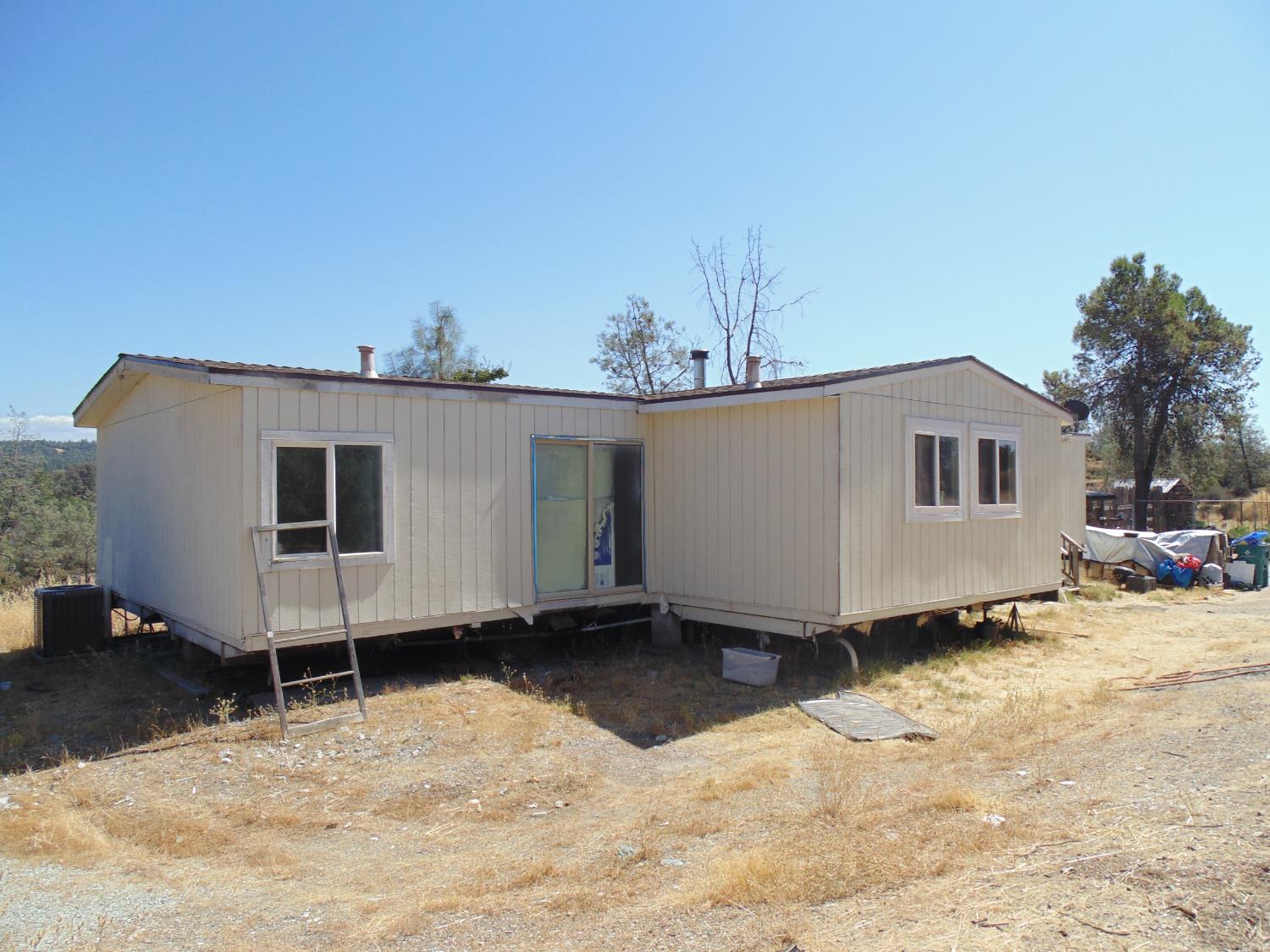 4161 Ginger Road Garden Valley, CA 95633 - Photo 7 of 32 a view of a house with a yard