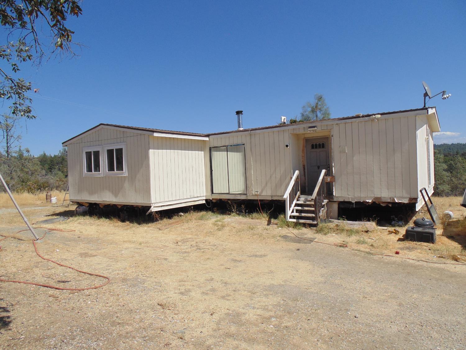 4161 Ginger Road Garden Valley, CA 95633 - Photo 9 of 32 a view of a house with patio