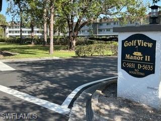5651 Rattlesnake Hamm Road, Unit C107 Naples, FL 34113 - Photo 1 of 20 ENTRANCE TO GOLF VIEW MANOR II