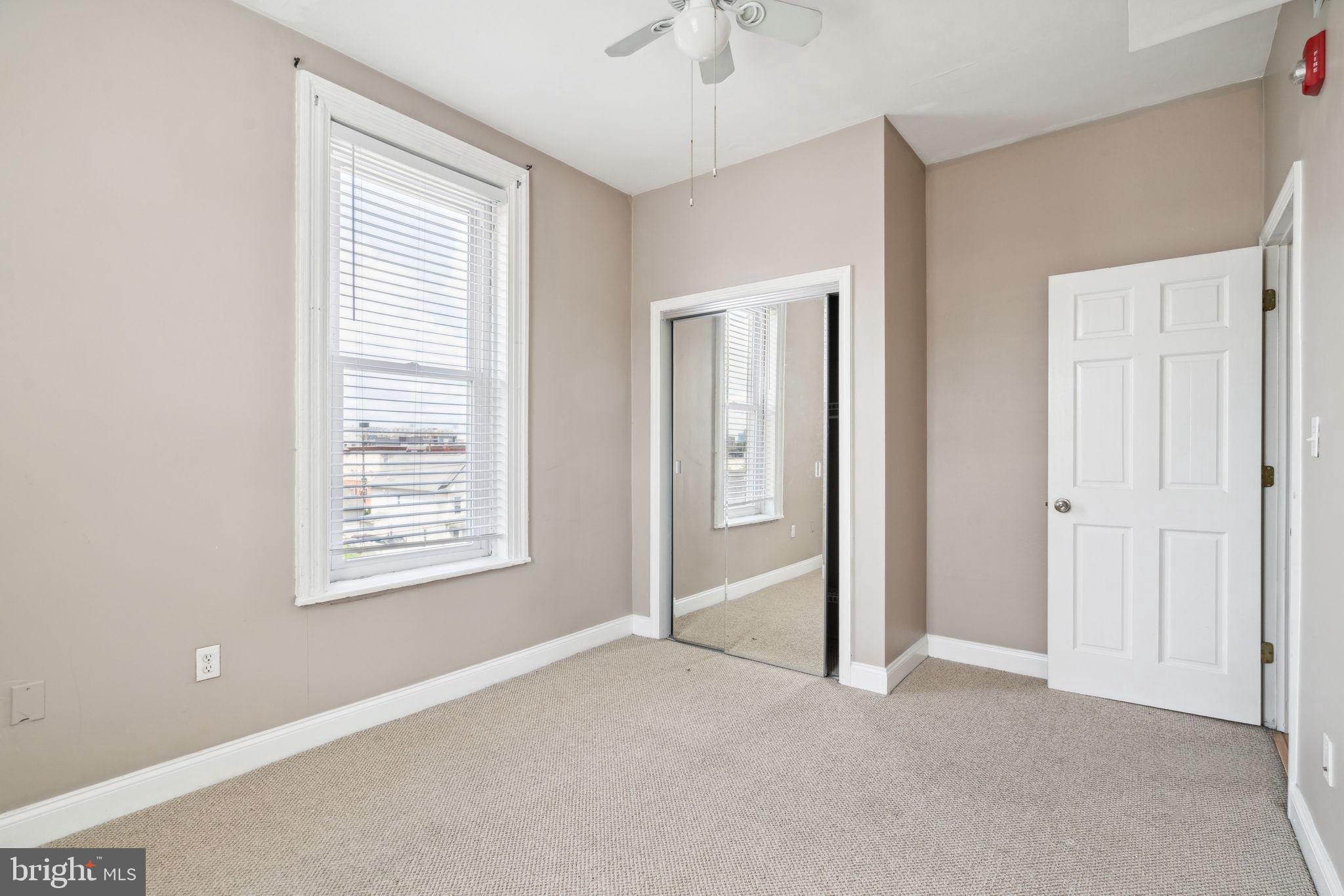 1936 North 7th Street, Unit 3 Philadelphia, PA 19122 - Photo 21 of 29 a view of an empty room with a window