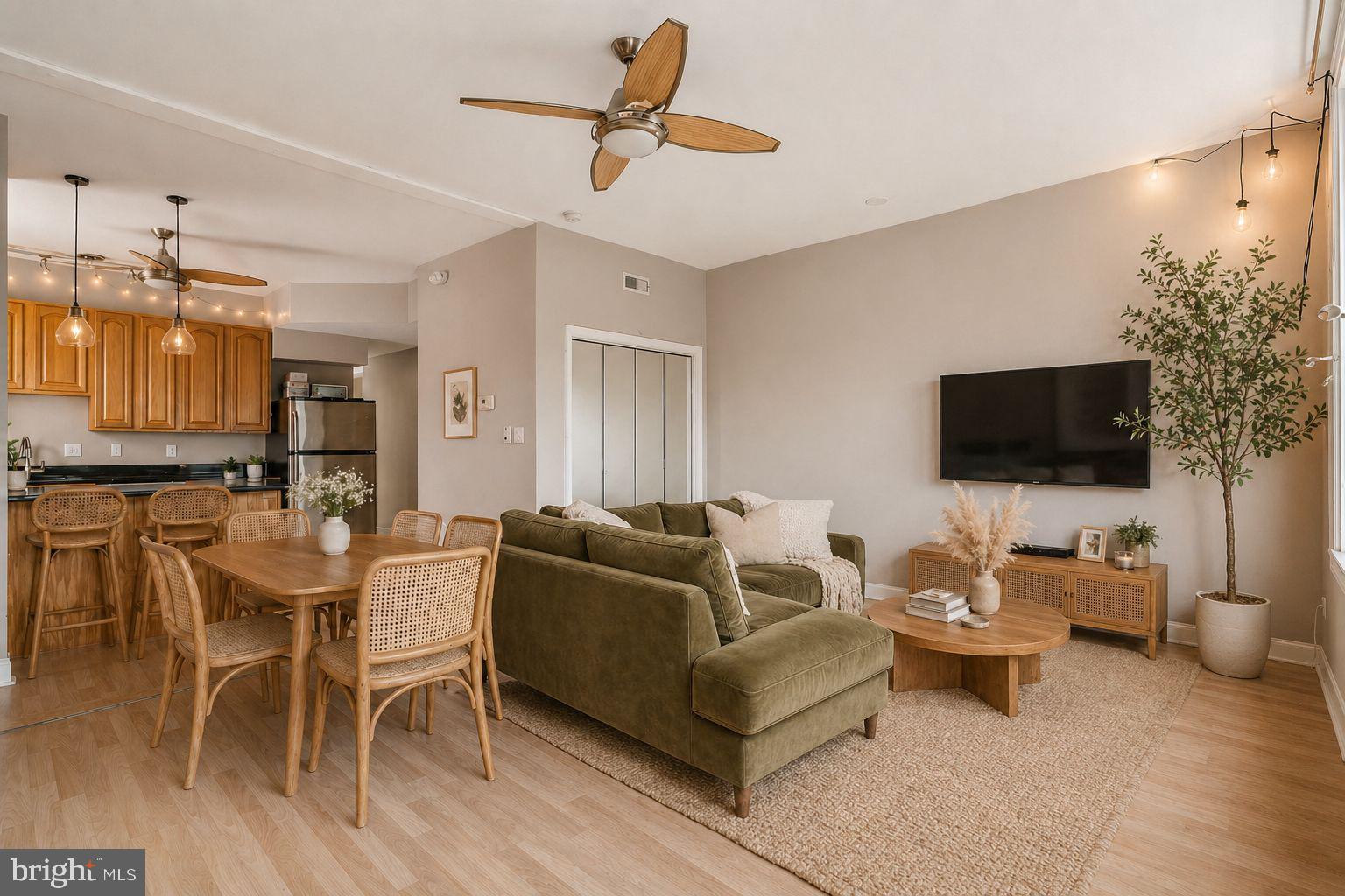1936 North 7th Street, Unit 3 Philadelphia, PA 19122 - Photo 3 of 29 a living room with furniture and a flat screen tv