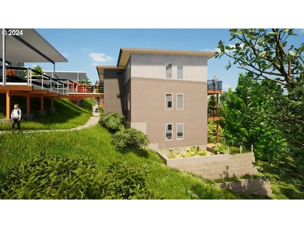 a view of a house with a backyard