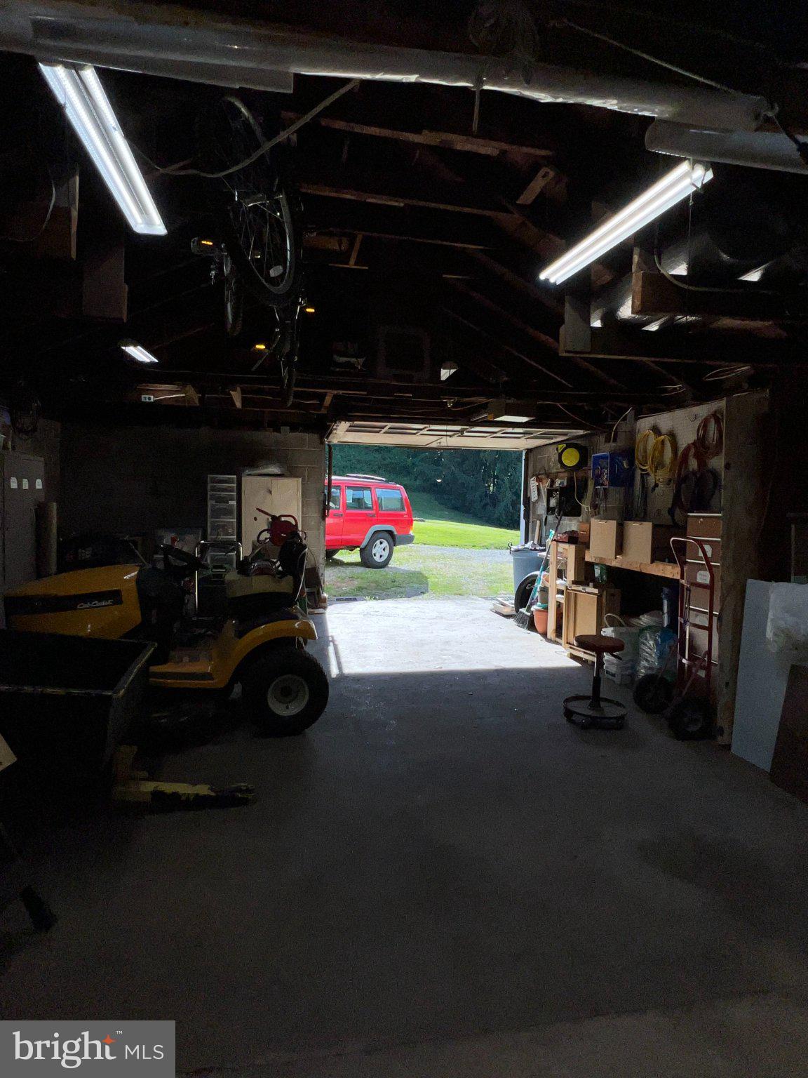 11402 Red Hill Road Southwest La Vale, MD 21502 - Photo 10 of 92 Spacious garage with bright lighting.