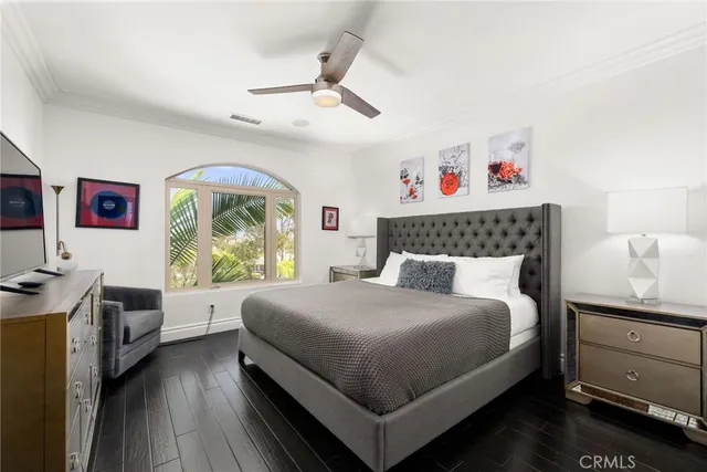 a bathroom with a sink mirror and toilet