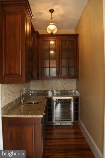 1304 Ruxton Road Ruxton, MD 21204 - Photo 14 of 20 a kitchen with a sink and a refrigerator