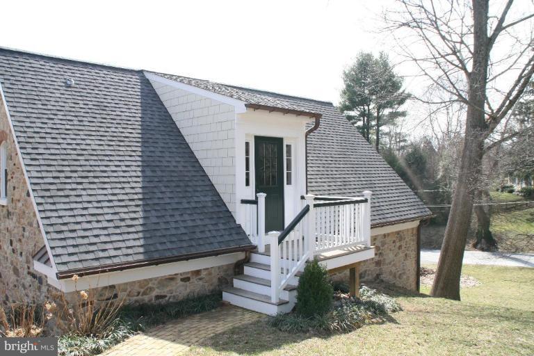 1304 Ruxton Road Ruxton, MD 21204 - Photo 18 of 20 a front view of a house with a yard