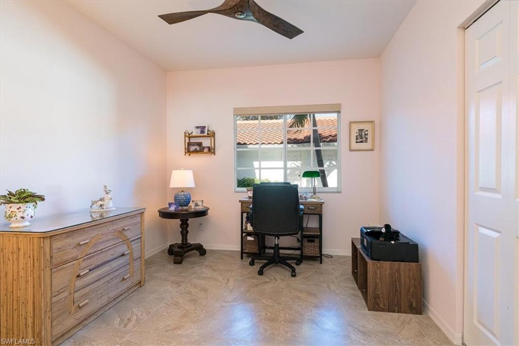 186 Gabriel Circle, Unit 3903 Naples, FL 34104 - Photo 16 of 42 Office with a ceiling fan and baseboards