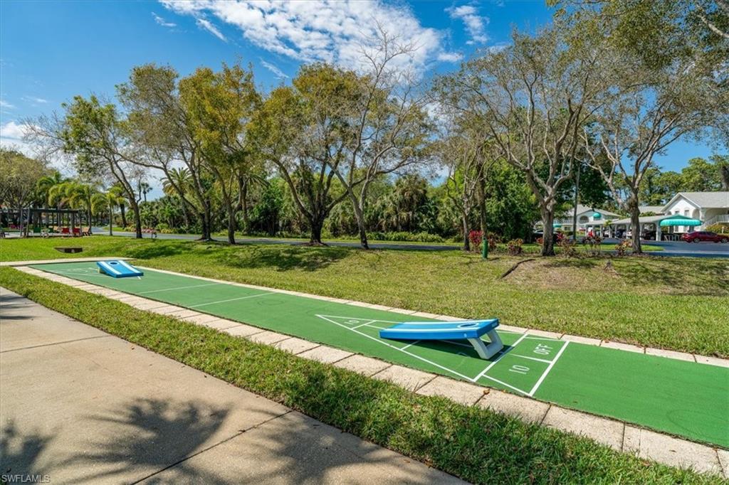 186 Gabriel Circle, Unit 3903 Naples, FL 34104 - Photo 32 of 42 Surrounding community featuring shuffleboard