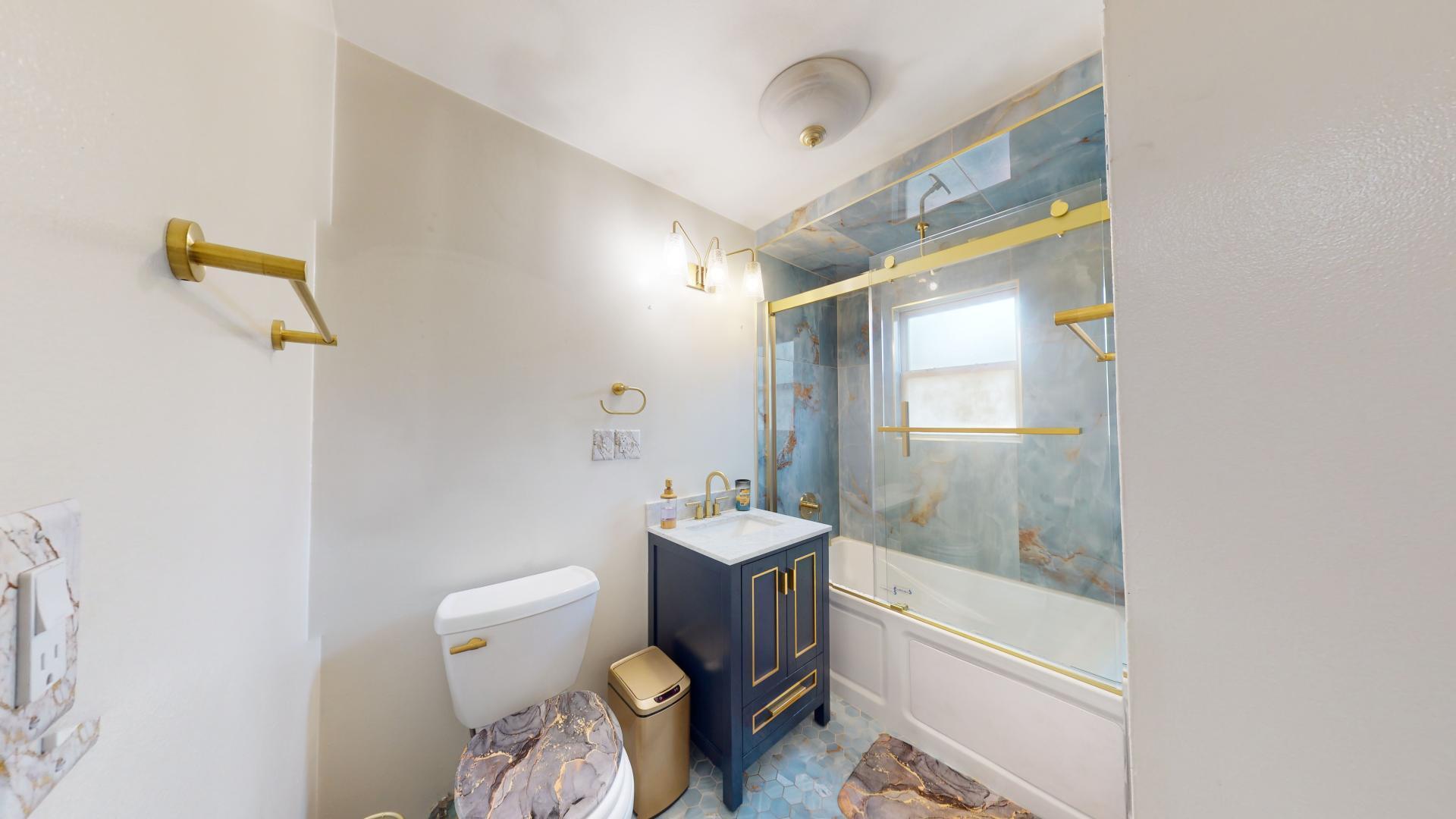 327 South 18th Street Chesterton, IN 46304 - Photo 12 of 29 a bathroom with a sink toilet and shower