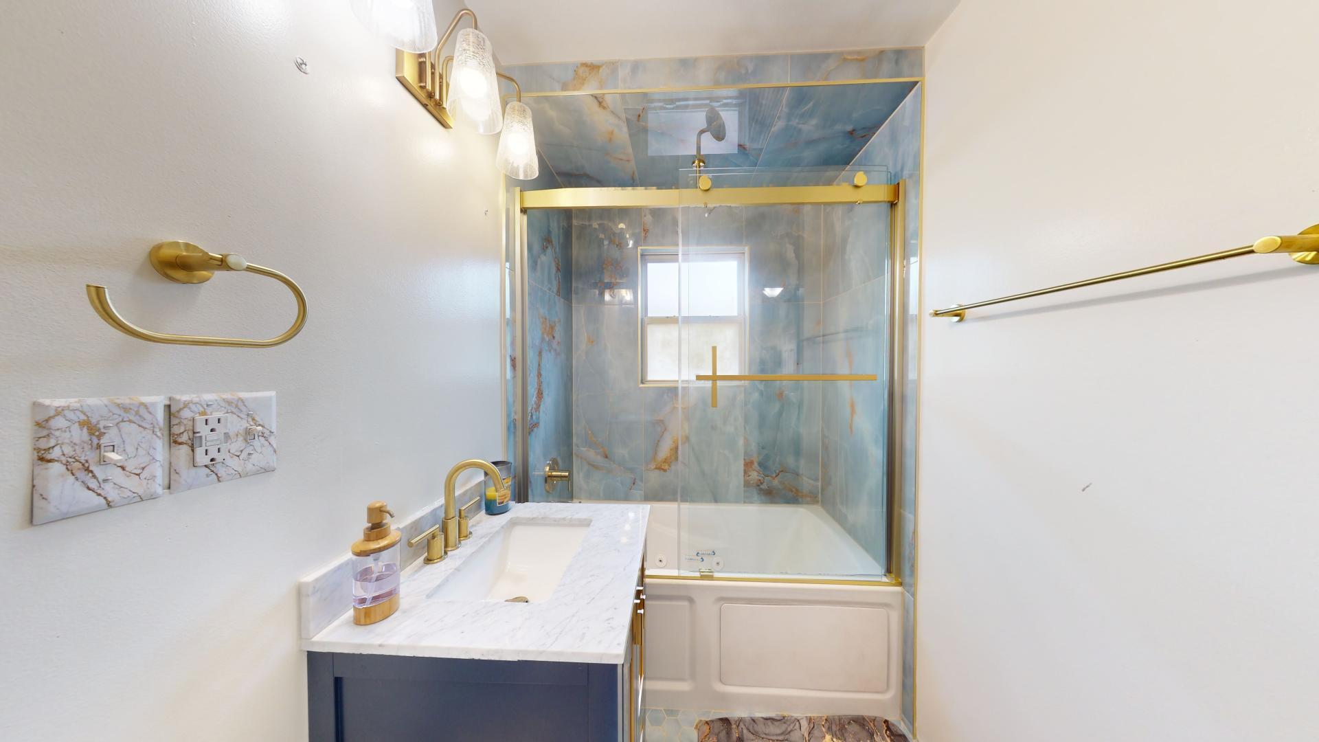 327 South 18th Street Chesterton, IN 46304 - Photo 13 of 29 a bathroom with a sink and a mirror