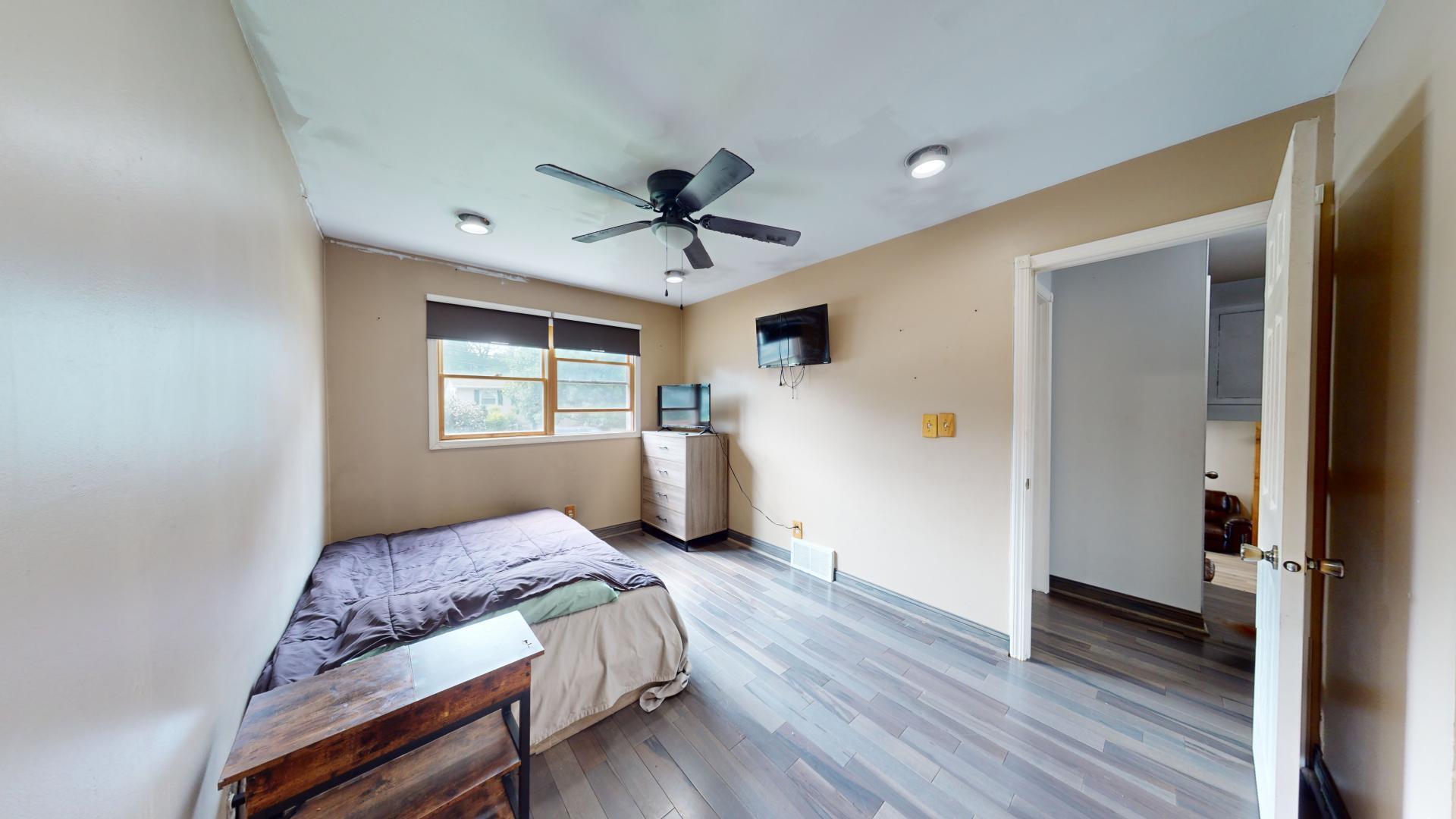 327 South 18th Street Chesterton, IN 46304 - Photo 17 of 29 a living room with furniture and a window