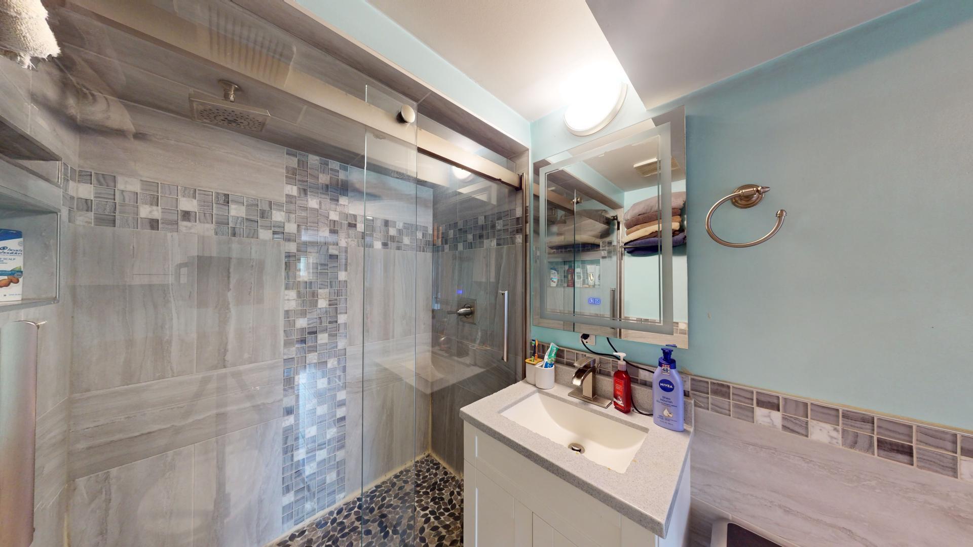 327 South 18th Street Chesterton, IN 46304 - Photo 20 of 29 a bathroom with a sink mirror vanity and toilet