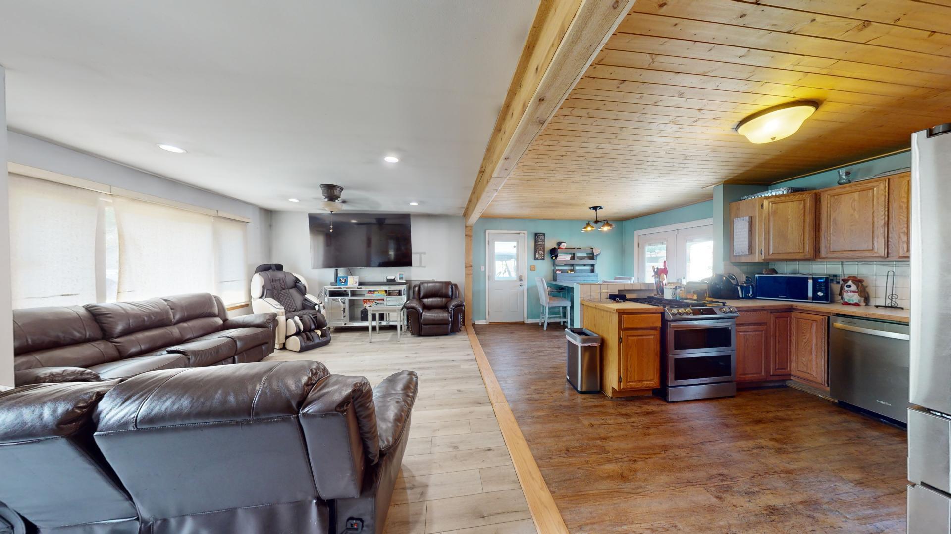 327 South 18th Street Chesterton, IN 46304 - Photo 6 of 29 a living room with furniture and kitchen