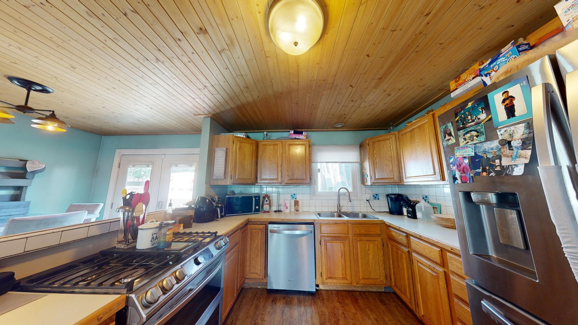 327 South 18th Street Chesterton, IN 46304 - Photo 7 of 29 a kitchen with lots of counter top space and wooden floor