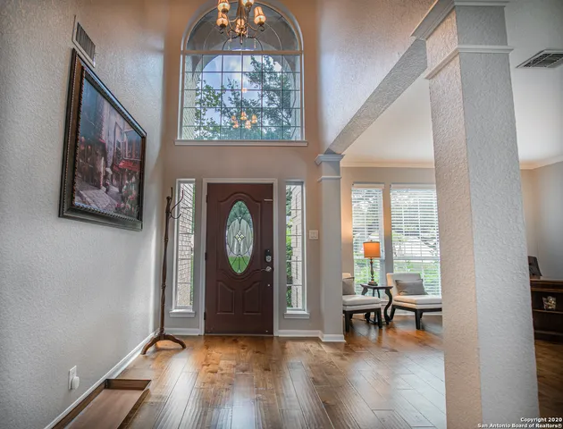 a view of a livingroom with furniture and a fireplace