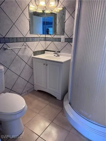 a bathroom with a toilet and a sink