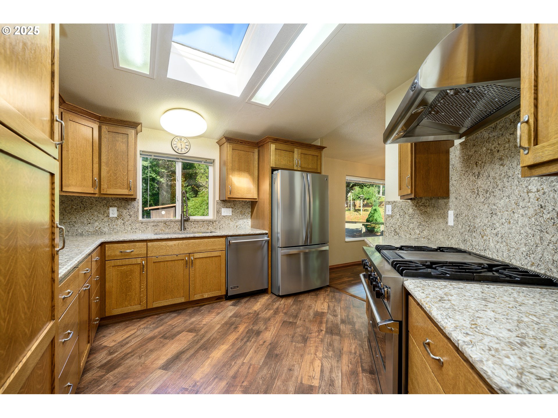 13330 Willamina Creek Road Willamina, OR 97396 - Photo 14 of 46 a kitchen with granite countertop a sink a counter space appliances and cabinets