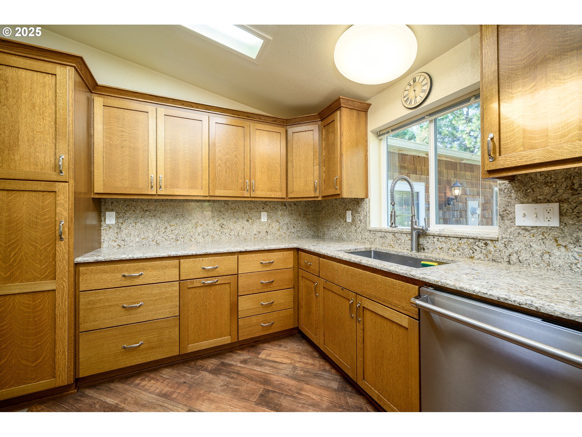 13330 Willamina Creek Road Willamina, OR 97396 - Photo 16 of 46 a kitchen with stainless steel appliances granite countertop a sink a stove and cabinets
