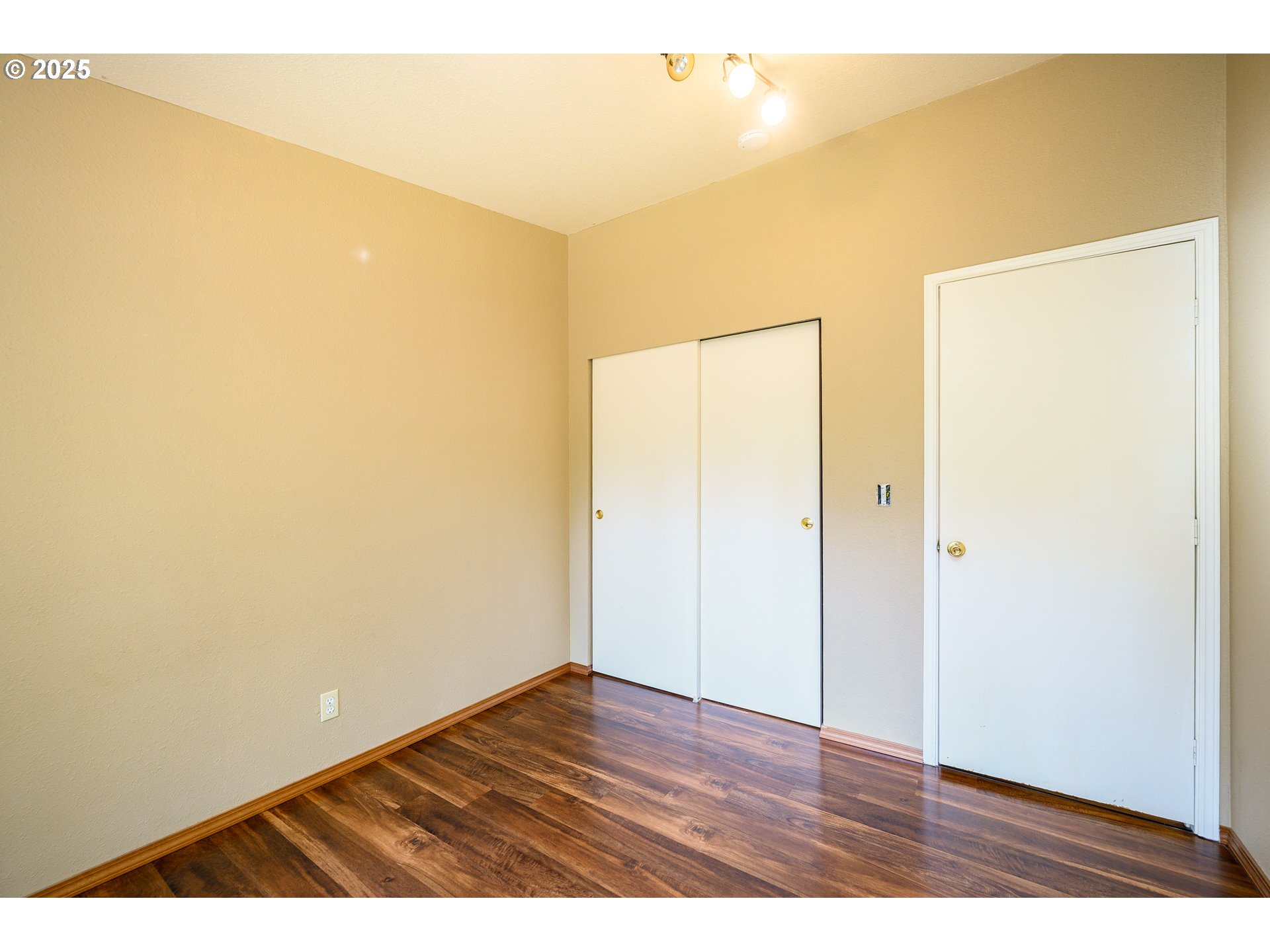 13330 Willamina Creek Road Willamina, OR 97396 - Photo 25 of 46 a view of an empty room with wooden floor