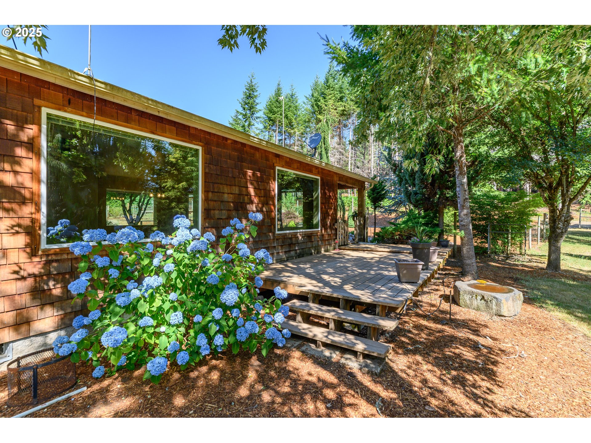 13330 Willamina Creek Road Willamina, OR 97396 - Photo 29 of 46 a front view of a house with garden