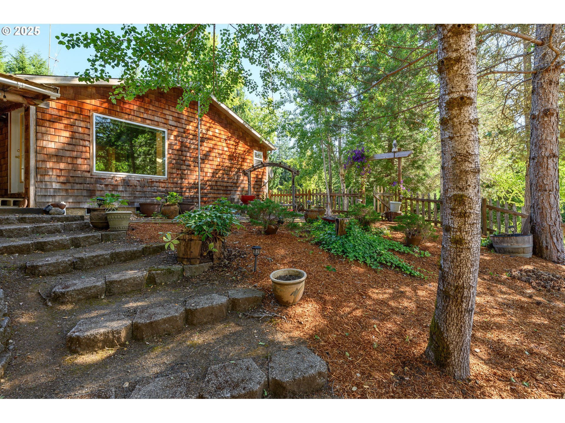 13330 Willamina Creek Road Willamina, OR 97396 - Photo 30 of 46 a backyard of a house with lots of green space