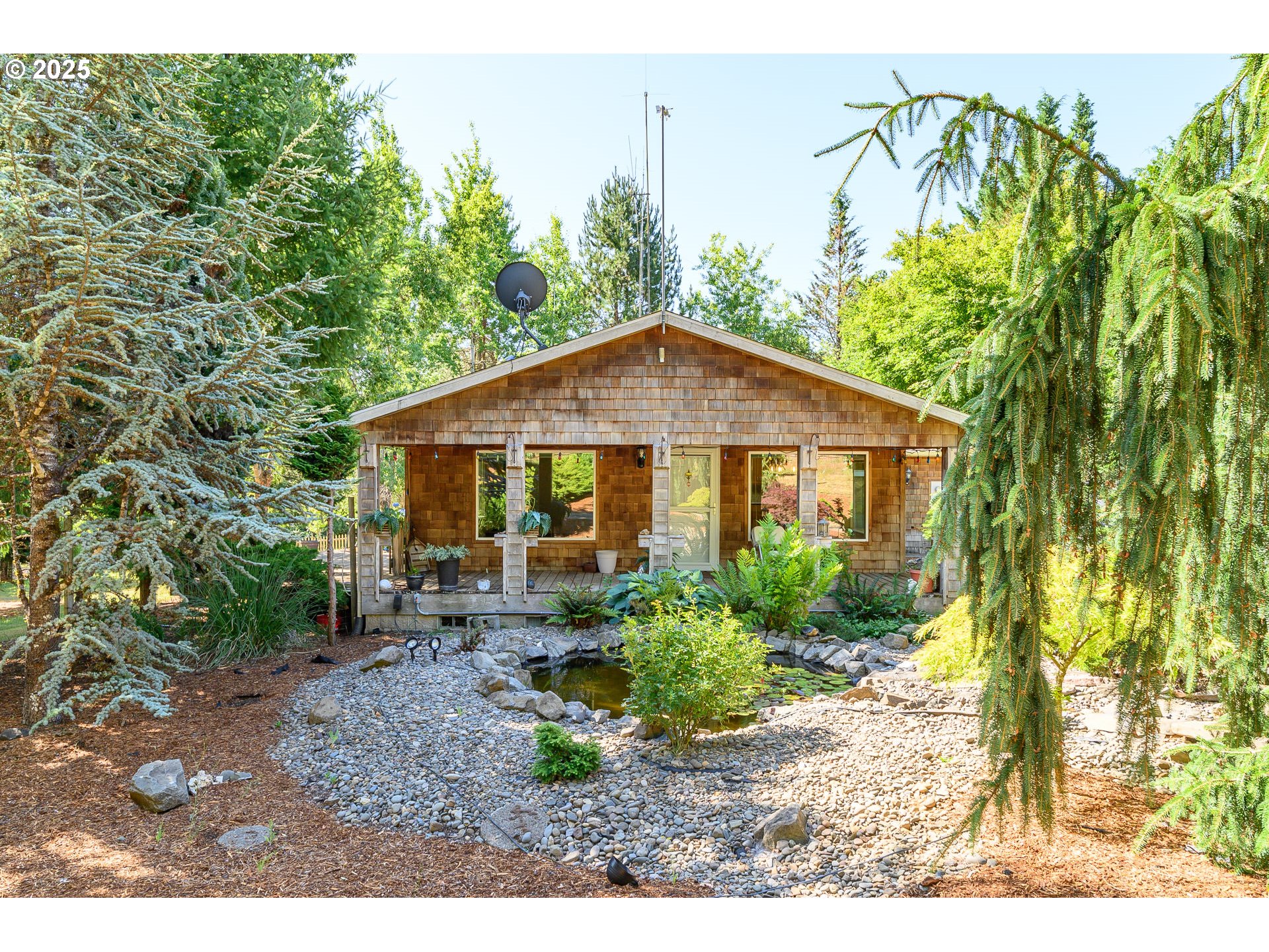 13330 Willamina Creek Road Willamina, OR 97396 - Photo 5 of 46 a view of a house with a yard