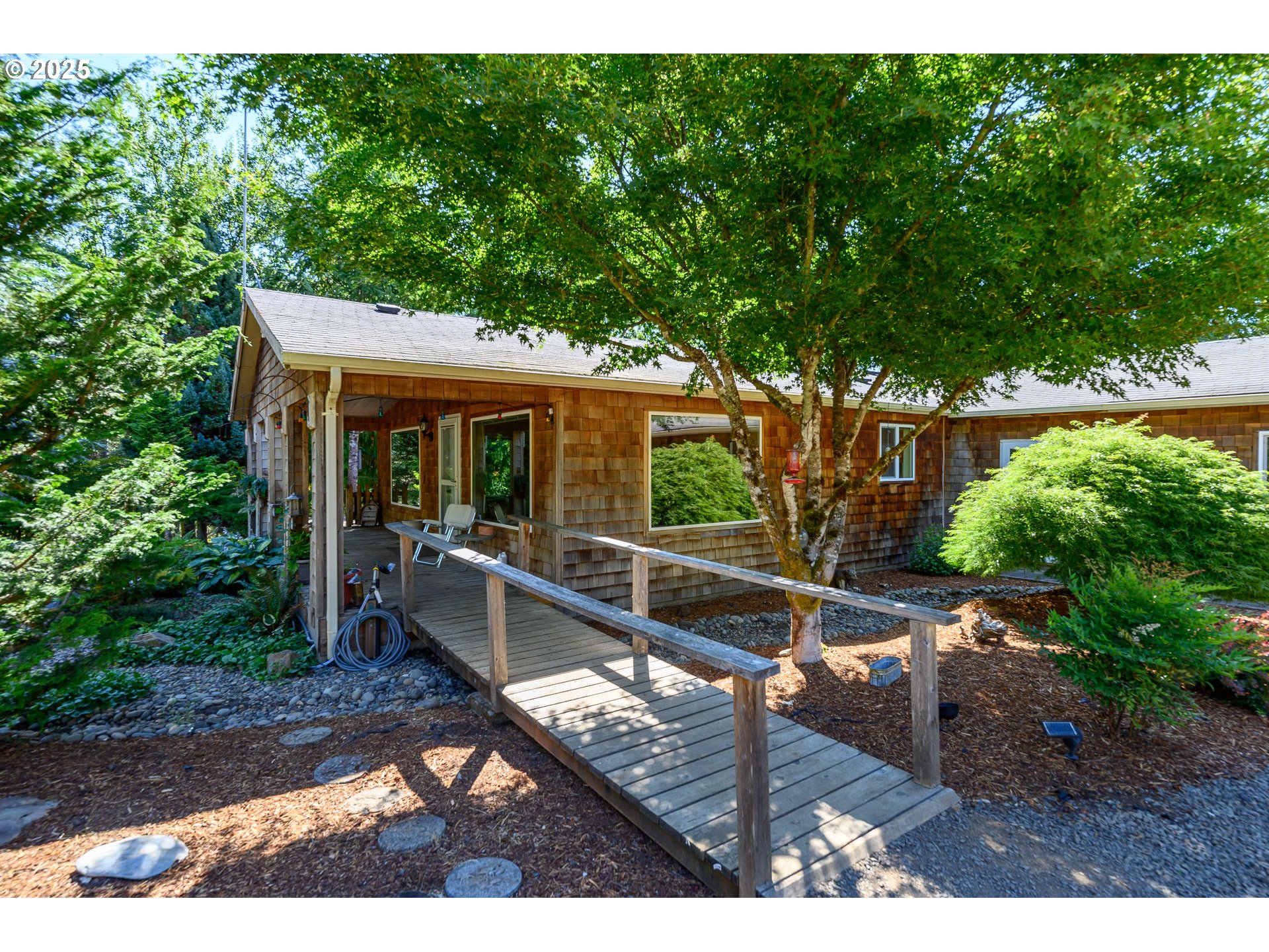 13330 Willamina Creek Road Willamina, OR 97396 - Photo 6 of 46 a view of house with backyard outdoor seating and green space