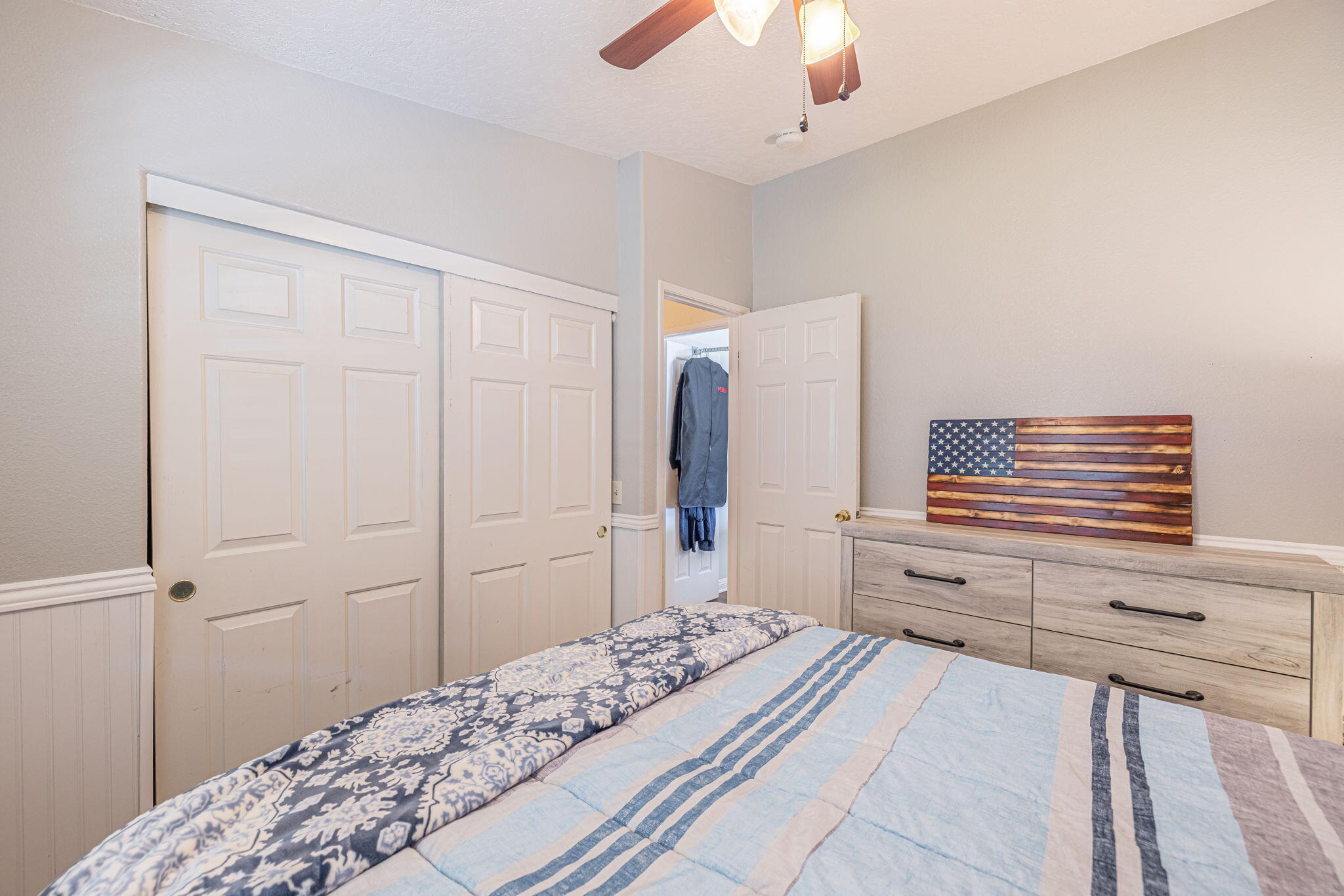 33105 Santiago Road Acton, CA 93510 - Photo 17 of 73 a bedroom with a bed and a ceiling fan