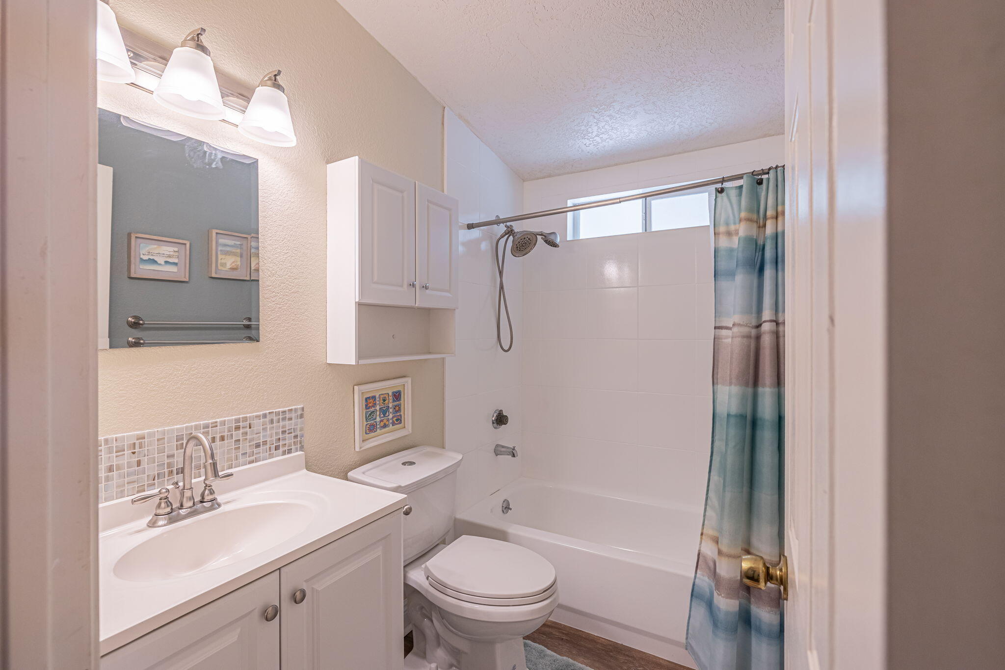 33105 Santiago Road Acton, CA 93510 - Photo 18 of 73 a bathroom with a sink a toilet and shower