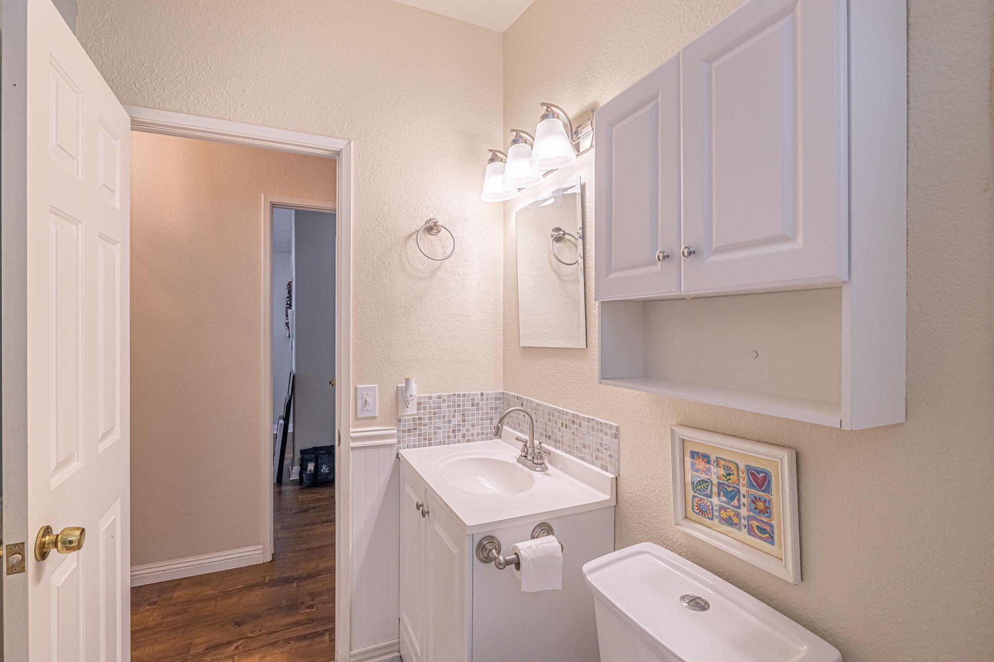 33105 Santiago Road Acton, CA 93510 - Photo 19 of 73 a bathroom with a sink a vanity and a mirror