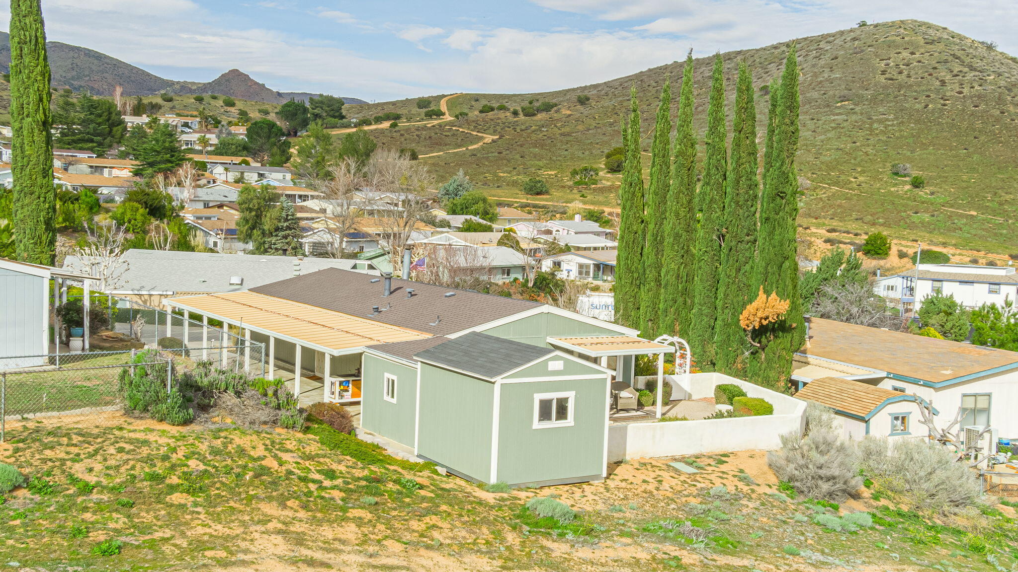 33105 Santiago Road Acton, CA 93510 - Photo 53 of 73 a view of a city with tall buildings