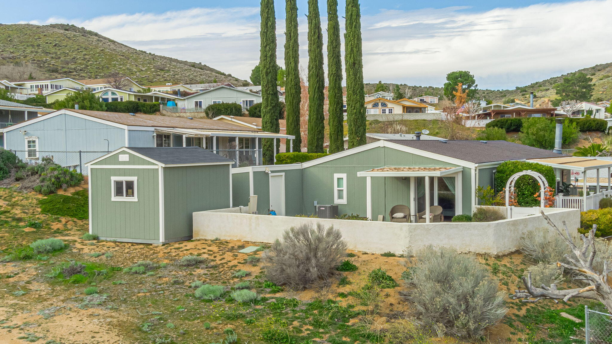 33105 Santiago Road Acton, CA 93510 - Photo 55 of 73 a front view of a house with a yard