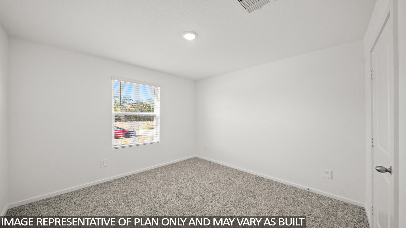 116 Baby Calf Roping Road Jarrell, TX 76537 - Photo 19 of 23 A well-lit room awaits your personal touch, featuring soft carpet and a window with natural illumination.